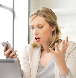 picture of confused woman with cell phone